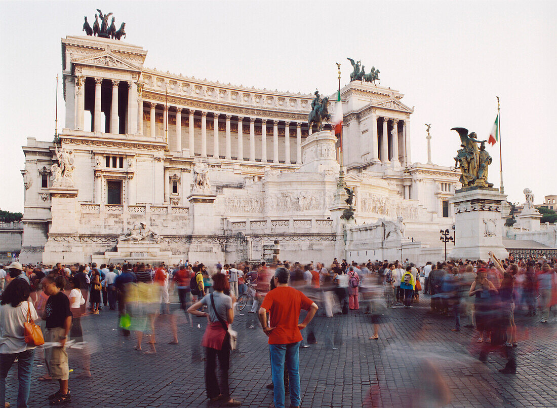 A crowd of people in front of the National Monument, Monumento Nazionale a Vittorio Emanuele II, Piazza Venezia, Rome, Italy
