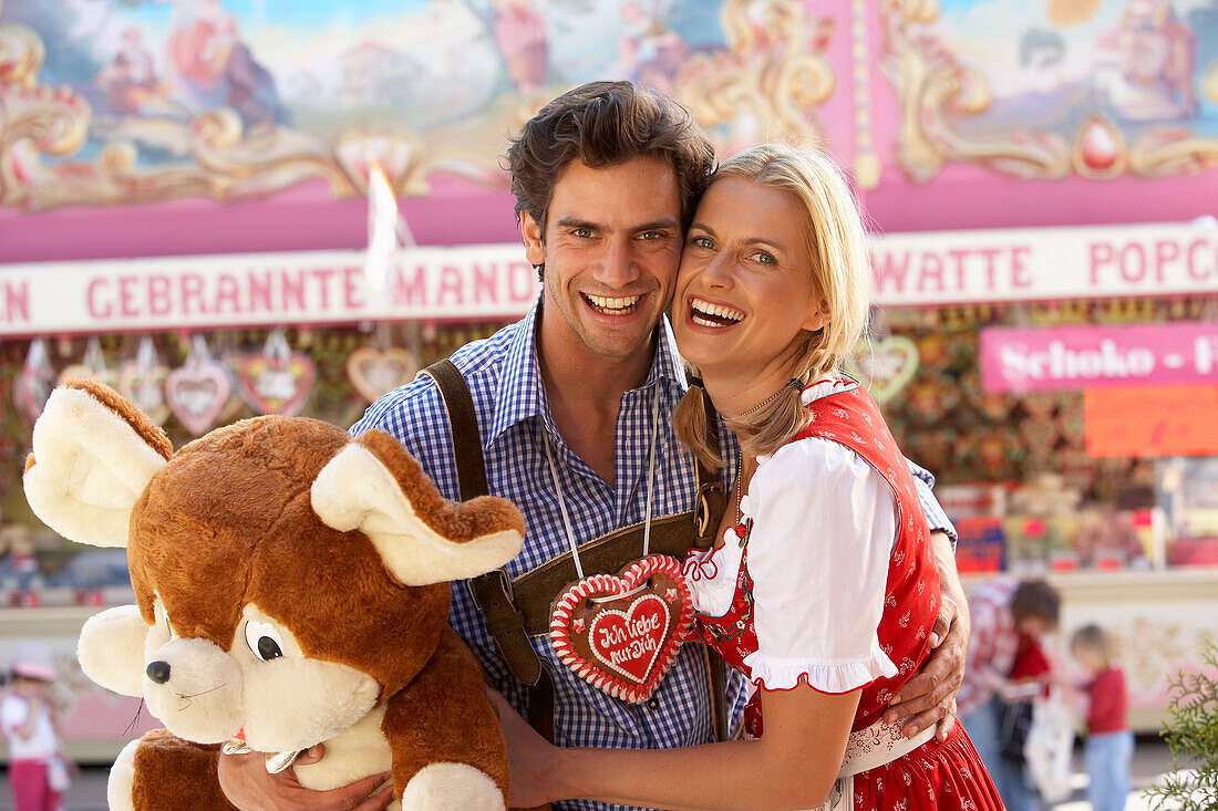 Couple enjoying fun fair