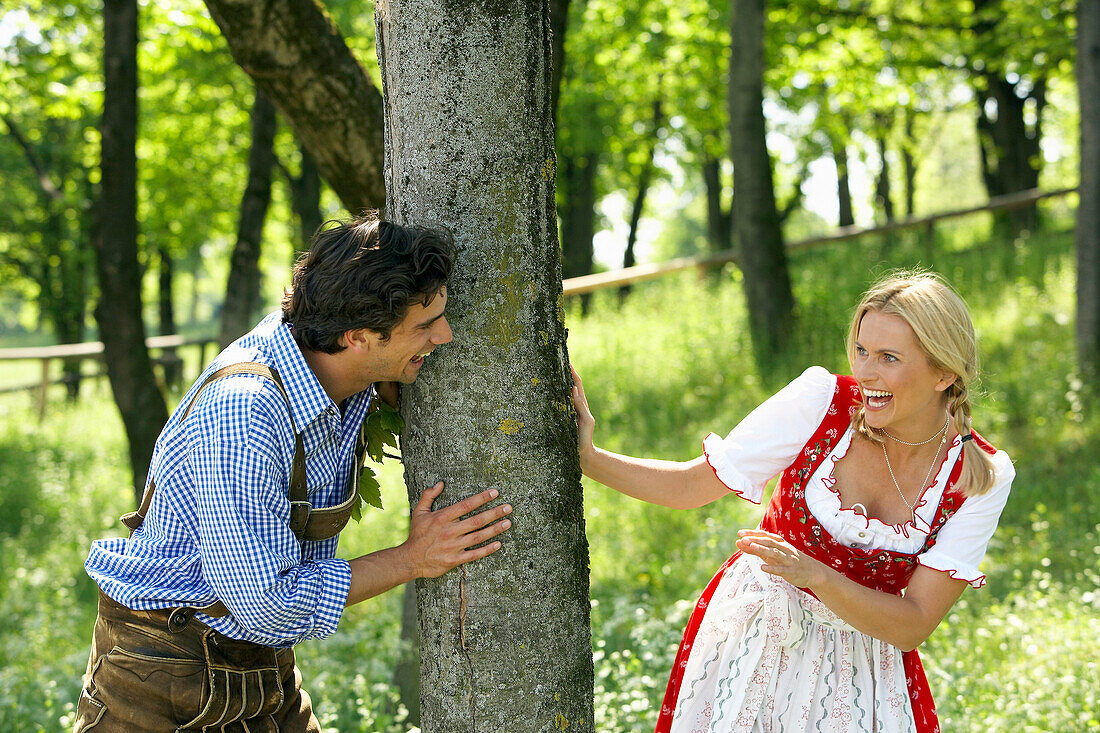 Couple playing hide-and-seek