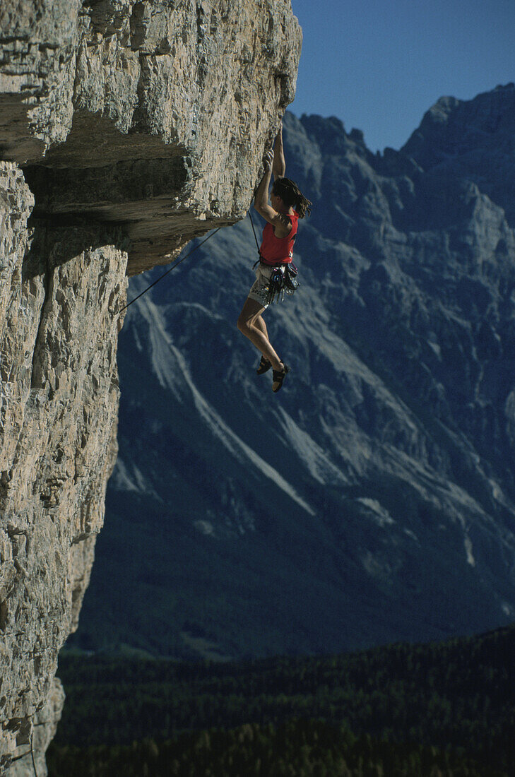 Climber at rock face, Tofana, Dolomites