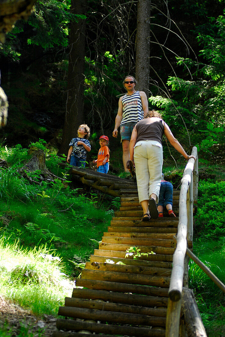 Family with children hiking at Falkenstein, near to the Rennsteig, Thuringia, Germany