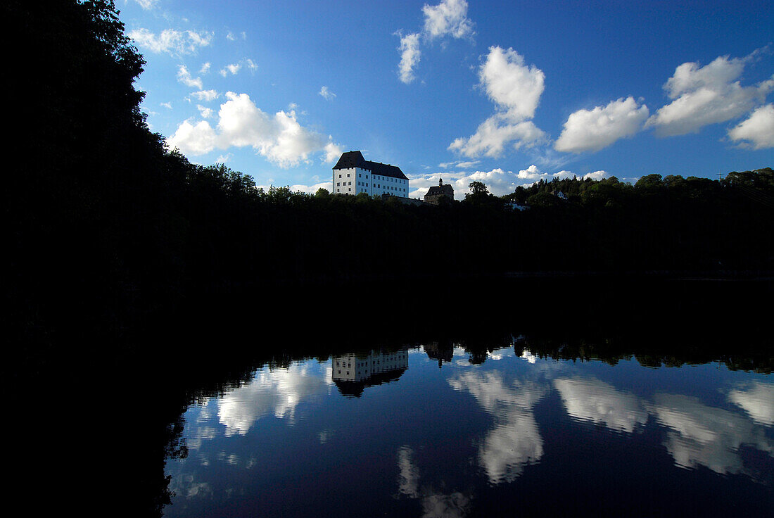 Castle Burgk with reflection in Saale river, Thuringia, Germany