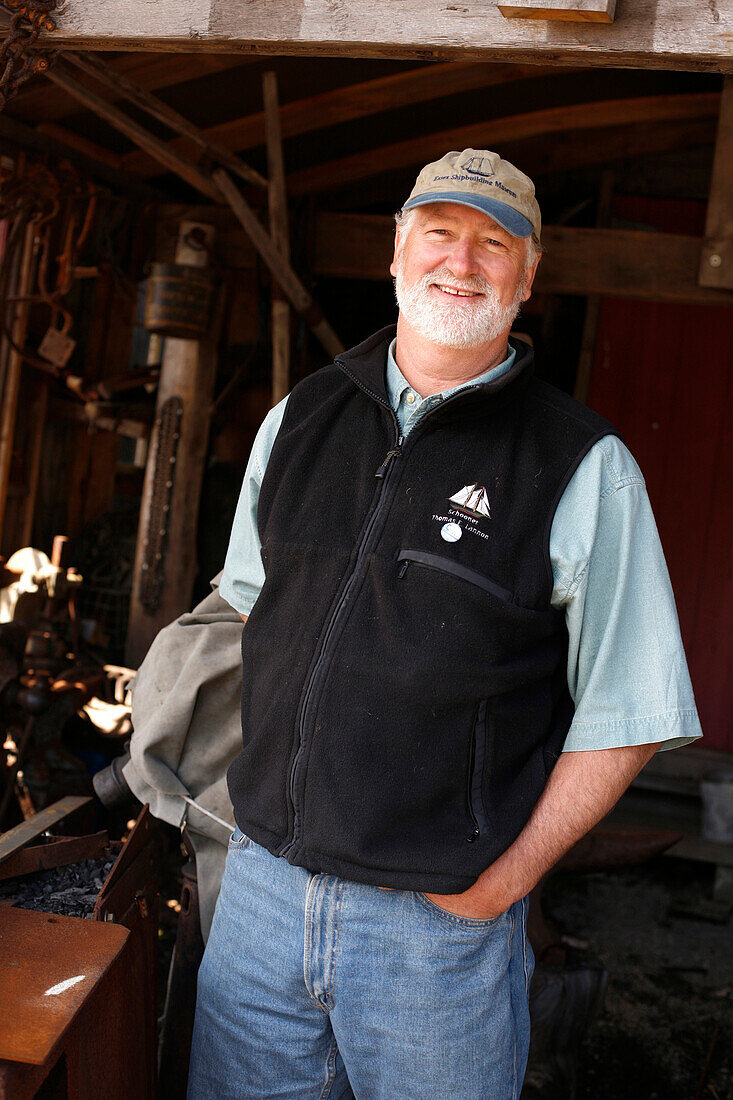 A man inside the Shipbuilding Museum, Essex, Massachusetts, USA