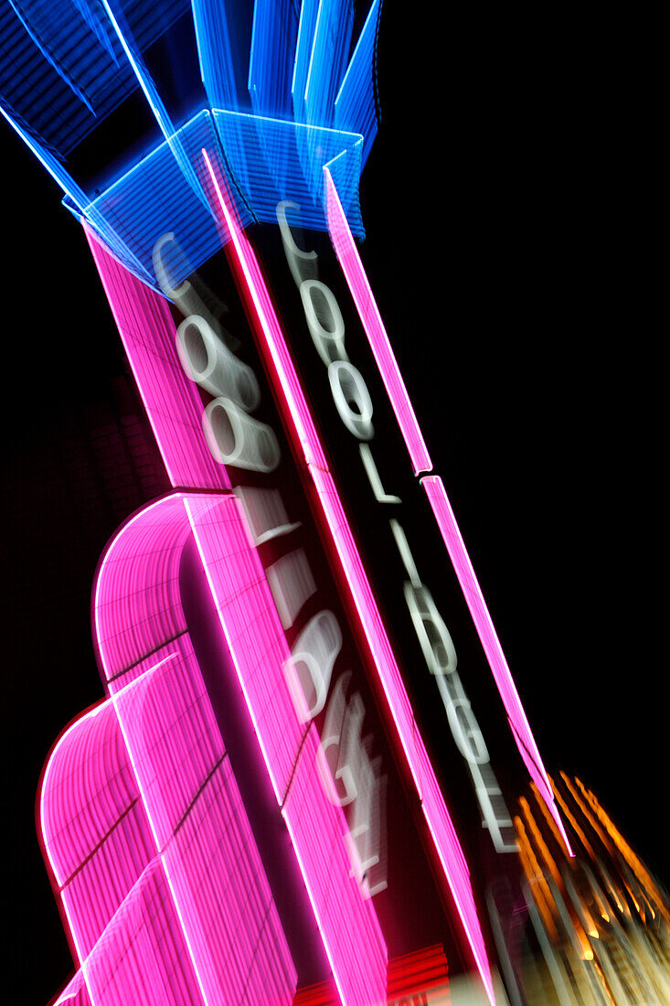 An illuminated neon sign at Coolidge Corner Cinema, Boston, Massachusetts, USA