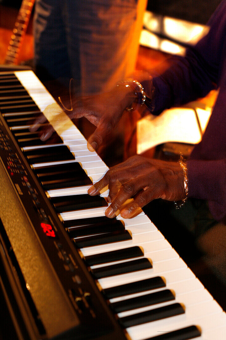 Musician playing the piano in Bobs Southern Bistro, Boston, Massachusetts, USA