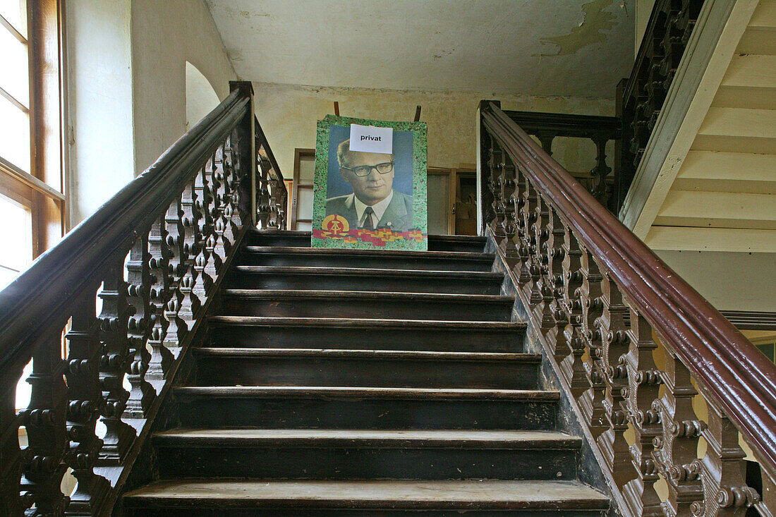 Honnecker poster blocking stairway entrance with the warning - private written on his head