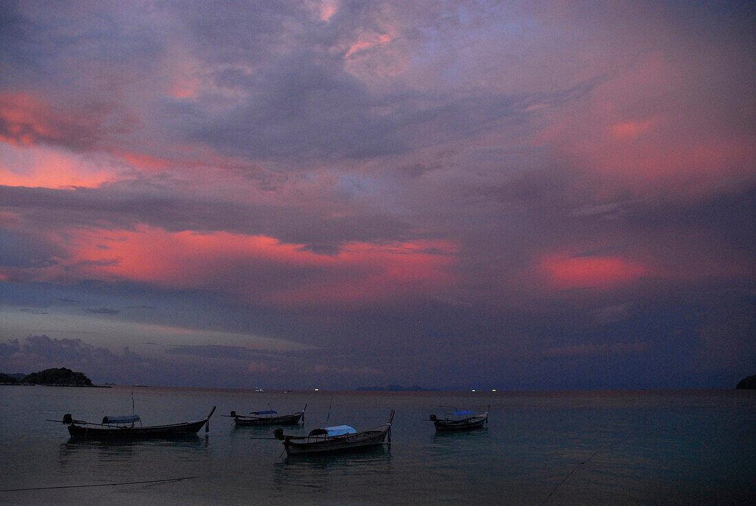 Evening sky and boats near the beach near Ko Lipe, Satun, Thailand