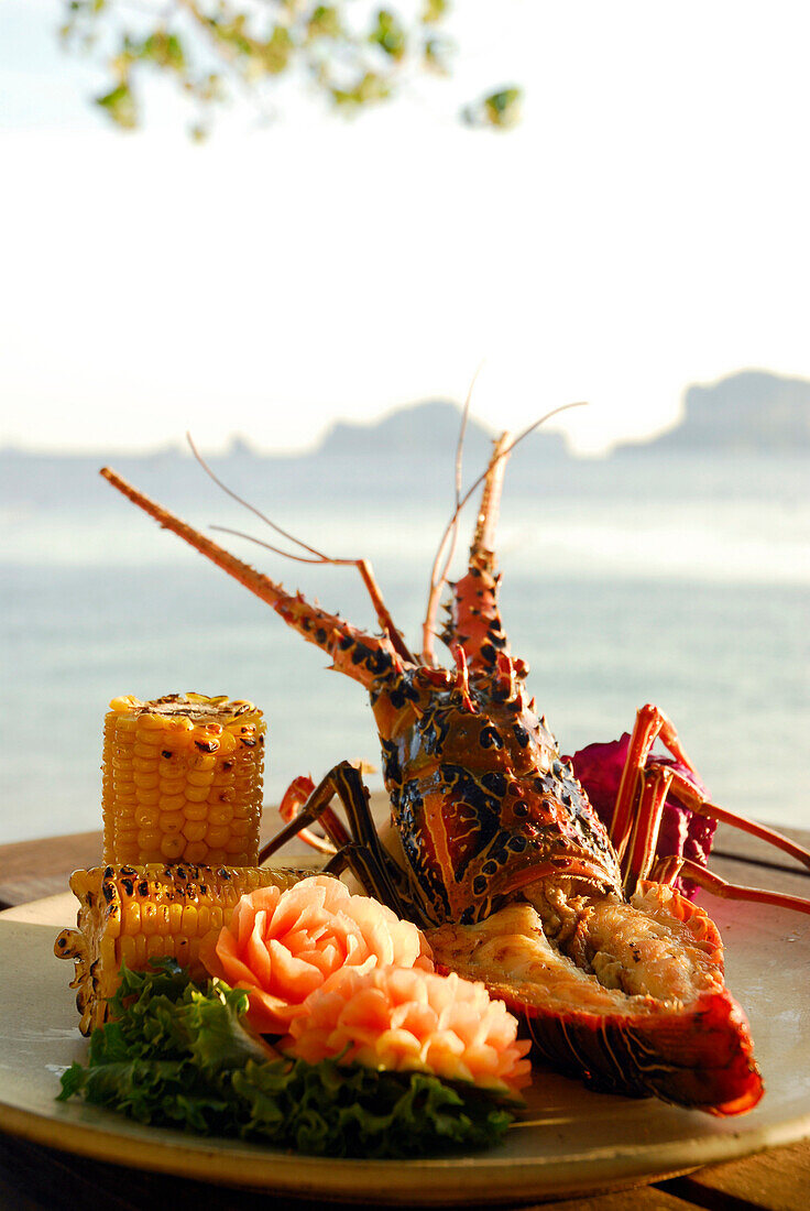 Spiny Lobster dish with sweetcorn at Beach Restaurant The Grotto and sea view, Hotel Rayavadee, Hat Phra Nang, Krabi, Thailand