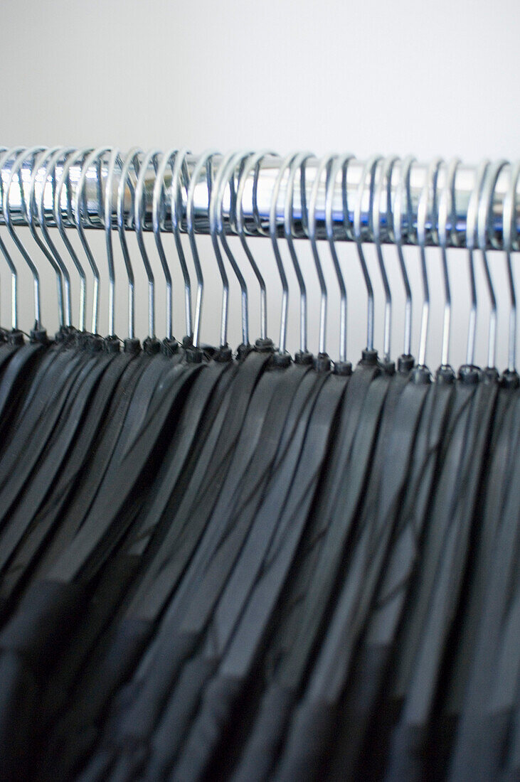 Clothes hangers on clothes rail, Munich, Upper Bavaria, Bavaria, Germany