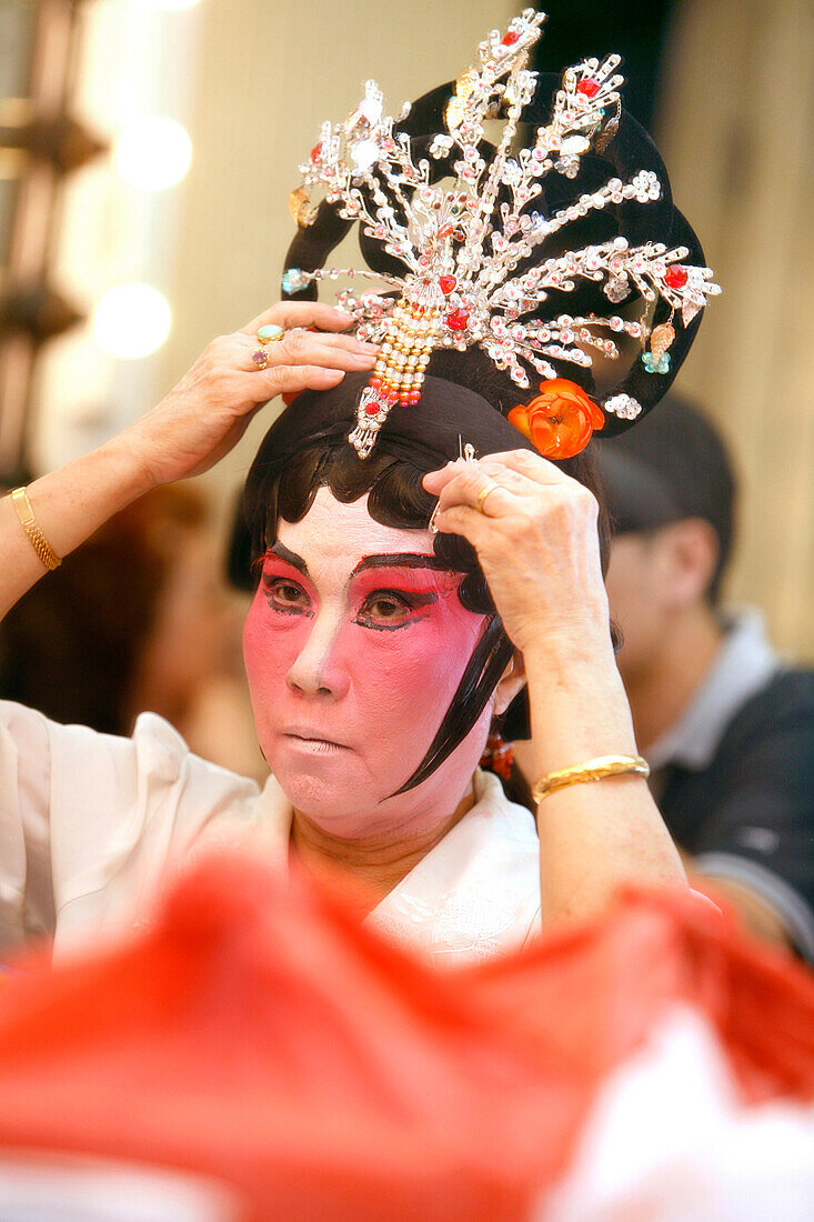 Woman in mask, Chinese Opera at the Kreta Ayer Theatre, Chinatown, Singapore