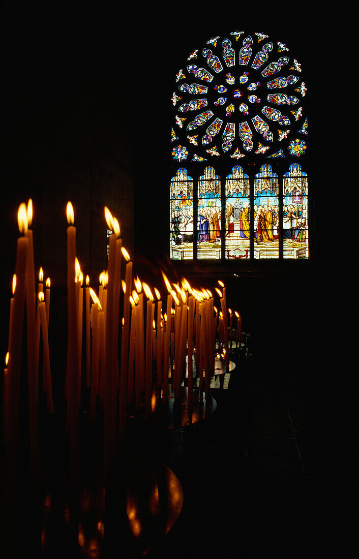 Candles in church, Le Folgoet, Brittany, France