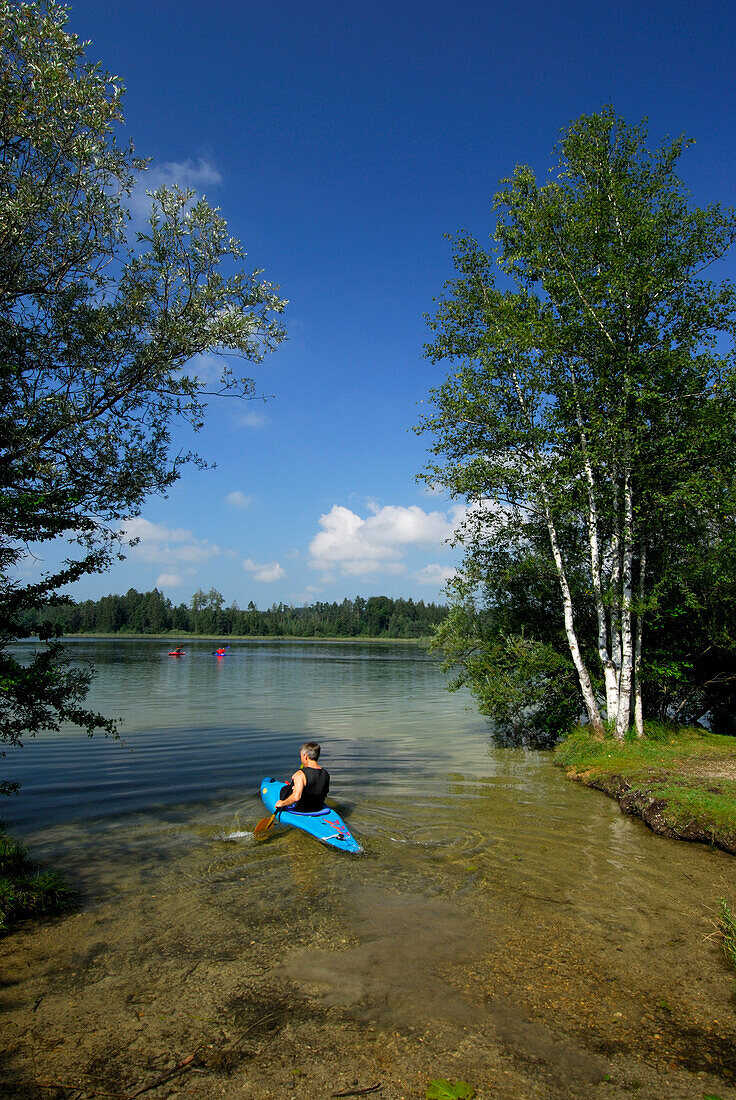 kayakers on lake Fohnsee, Osterseen, Upper Bavaria, Bavaria, Germany