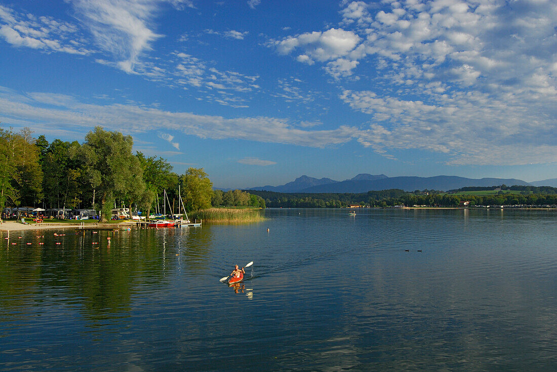 lake Waginger See with kayaker and sailing boats at campground, Tettenhausen, Chiemgau, Upper Bavaria, Bavaria, Germany