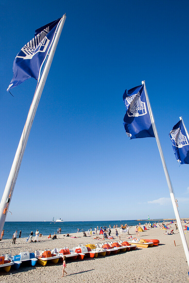 Flagpoles at beach Rostock-Warnemunde, Mecklenburg-Western Pomerania, Germany