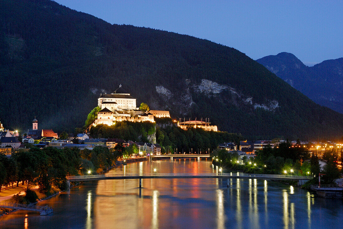 View over river Inn to Kufstein Fortress at night, Kufstein, Tyrol, Austria