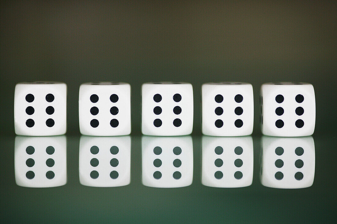 Five dice in a row showing number six