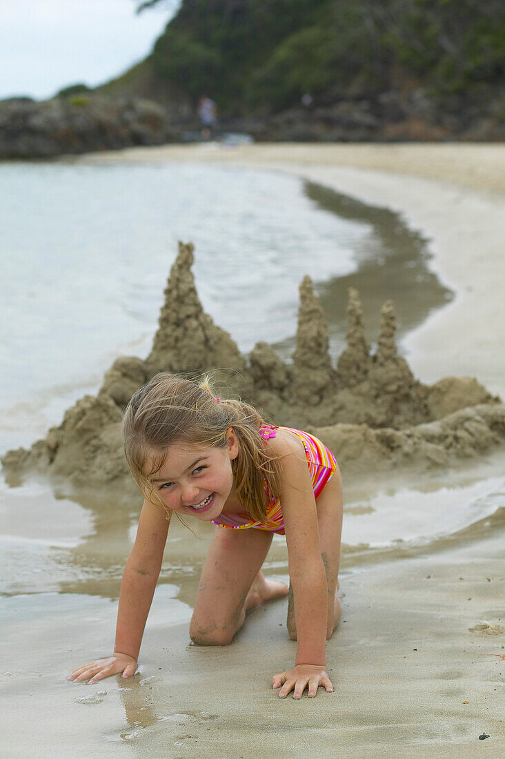 Girl at the beach, Karikari Bay at northern eastcoast, Northland, North Island, New Zealand