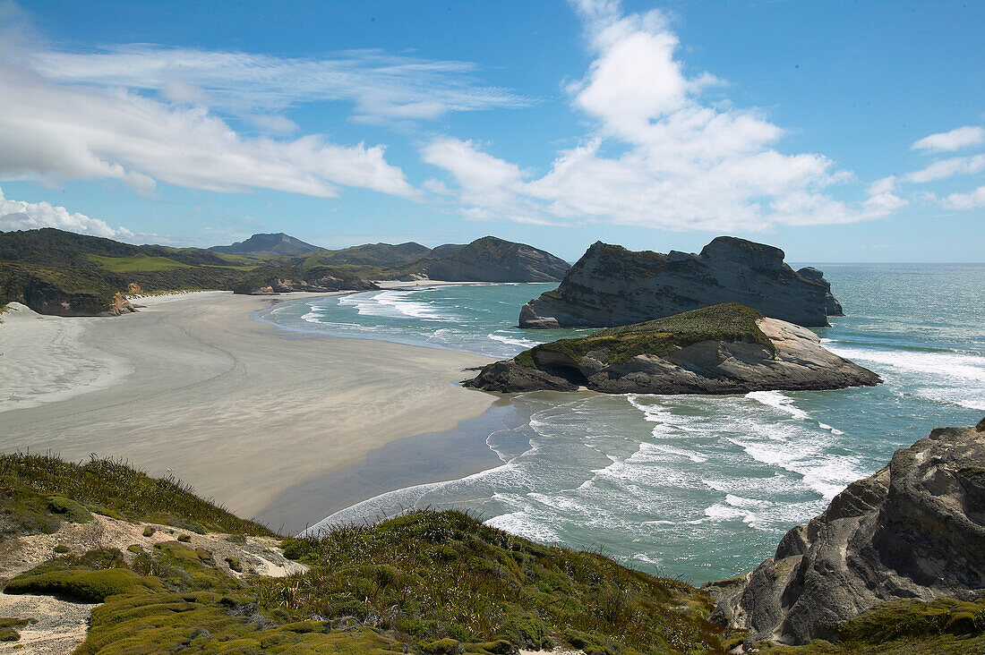 Wharariki Beach, tidal pools, low tide, near Puponga, northwestern coast of South Island, New Zealand