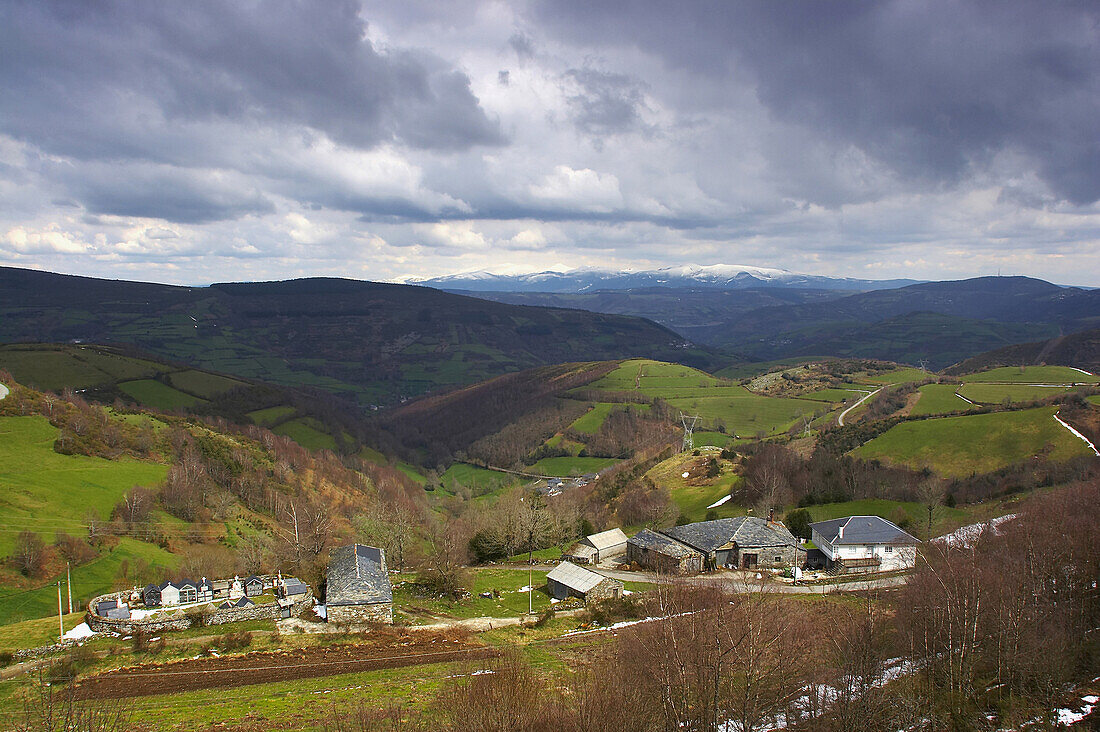 Landscape with church and farm, mountains in the distance, Cordillera Cantabrica, Punto el Poyo, Galicia, Spain