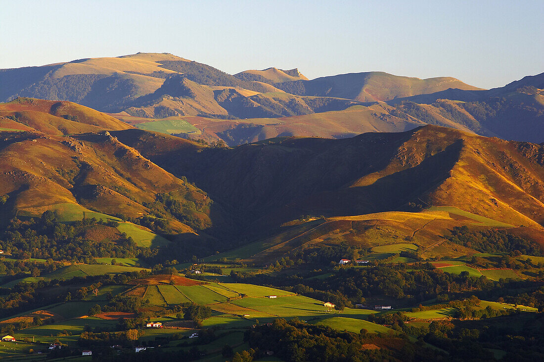 Landscape near St. Jean-Pied-de-Port in the early evening, view from Pic d'Arradoy, St. James Way, Pyrenees, Euskadi, Department Pyrénées-Atlantiques, France