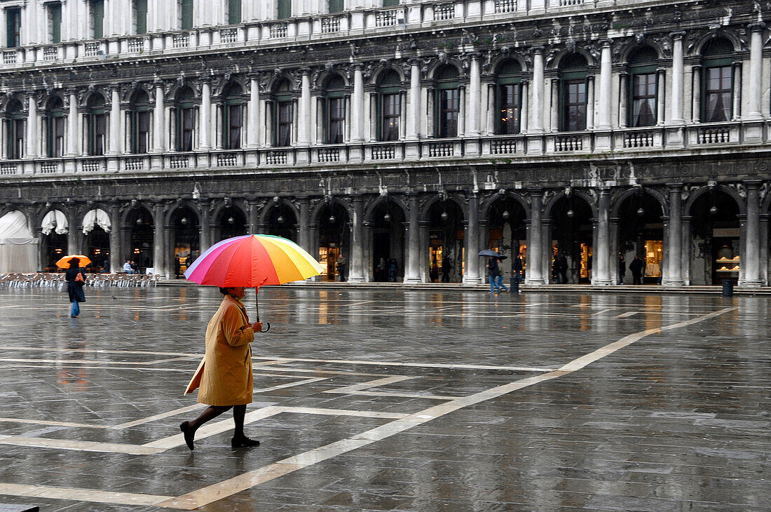 Rainy Piazza San Marco, Venice, Veneto, Italy, woman with umbrella