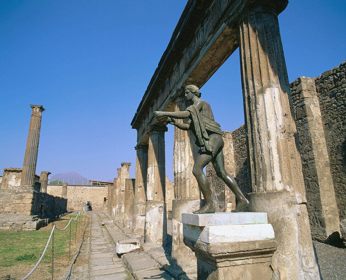 Apollo statue and temple. Ruins of the old Roman city of Pompeii. Italy