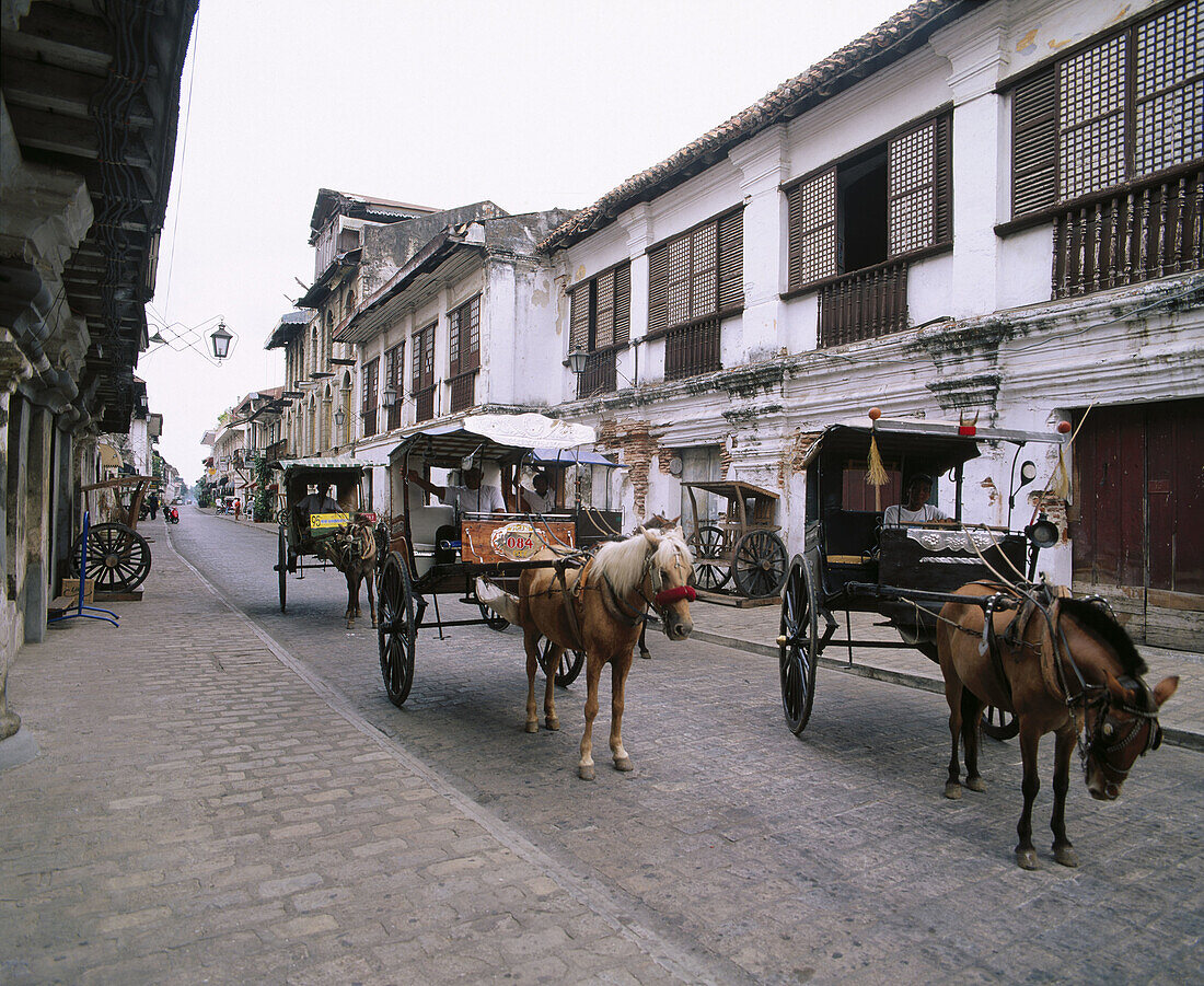 Calesas, horse drawn carriages. Mestizo District. Vigan. Northen Luzon. Philippines