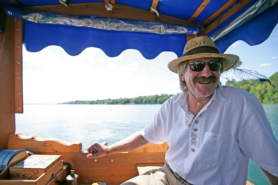 A man, Ferryman, Roseninsel Island, Possenhofen, Lake Starnberg, Bavaria, Germany