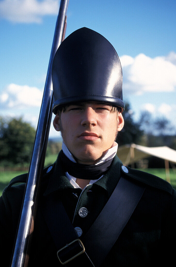 Young man wearing traditional costume, Killerton, Broadclyst, Exeter, Devon, England, United Kingdom