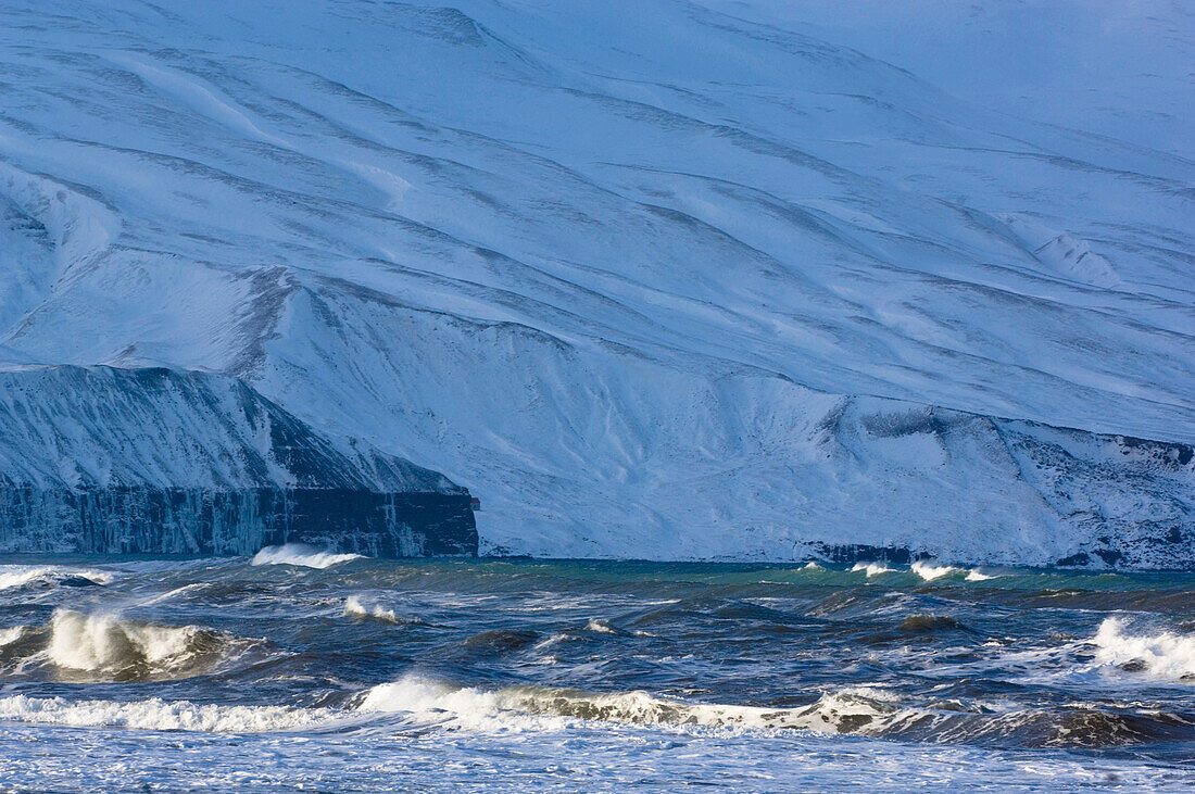 Waves in front of coastline, Iceland