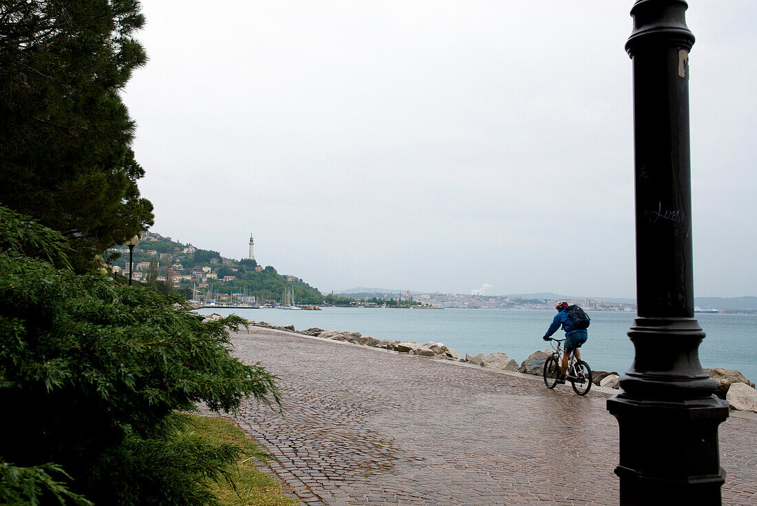 Mountainbiking along coastline of Adriatic Sea, Trieste, Friuli-Venezia Giulia