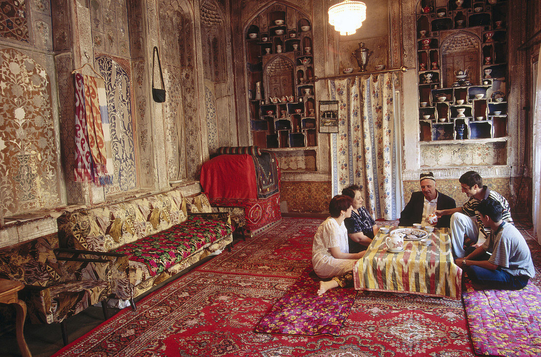 Silk road. Family in old house. Bukhara. Uzbekistan.