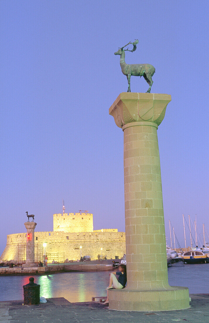 Column at port where it s supposed to have been the ancient Colossus. Rodhes. Greece