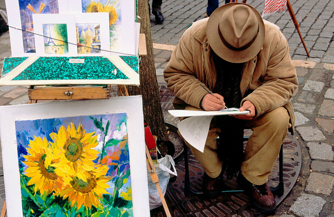 An artist in Plaza du Tertre . Montmartre. Paris. France