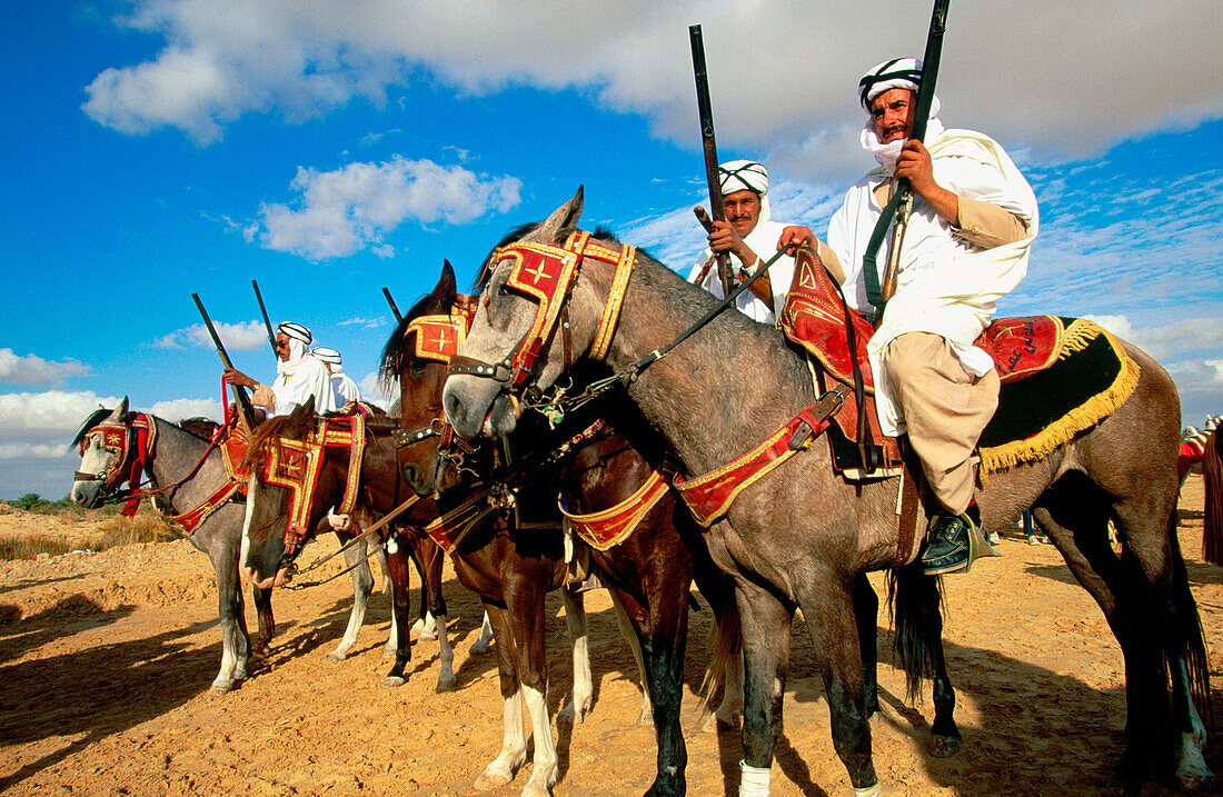 Lybian horsemen in the Sahara s Festival. Douz. Tunisia