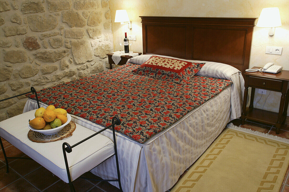Rural tourism. A bedroom in Villa de Abalos hotel