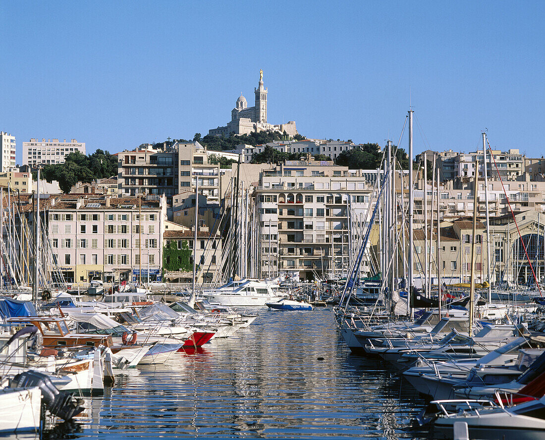 Old port and Notre Dame de la Garde basilica, Marseille. France