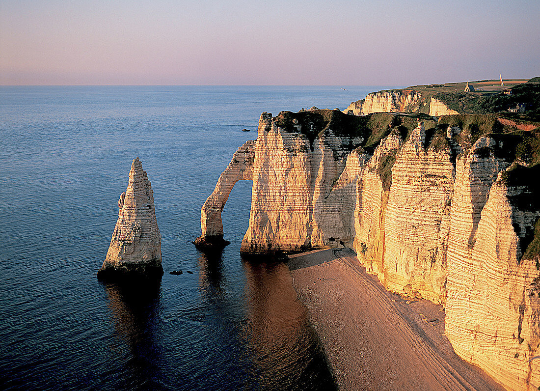 Cliffs and rock arch of Etretat. Normandy. France.