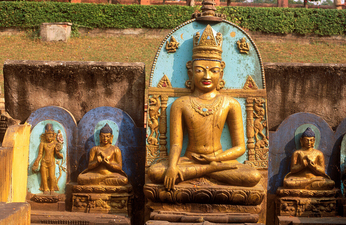 Lord buddha in the Touching the earth posture (commemorative stone). Near Mahabodhi Temple. Bodhgaya. Bihar State. India