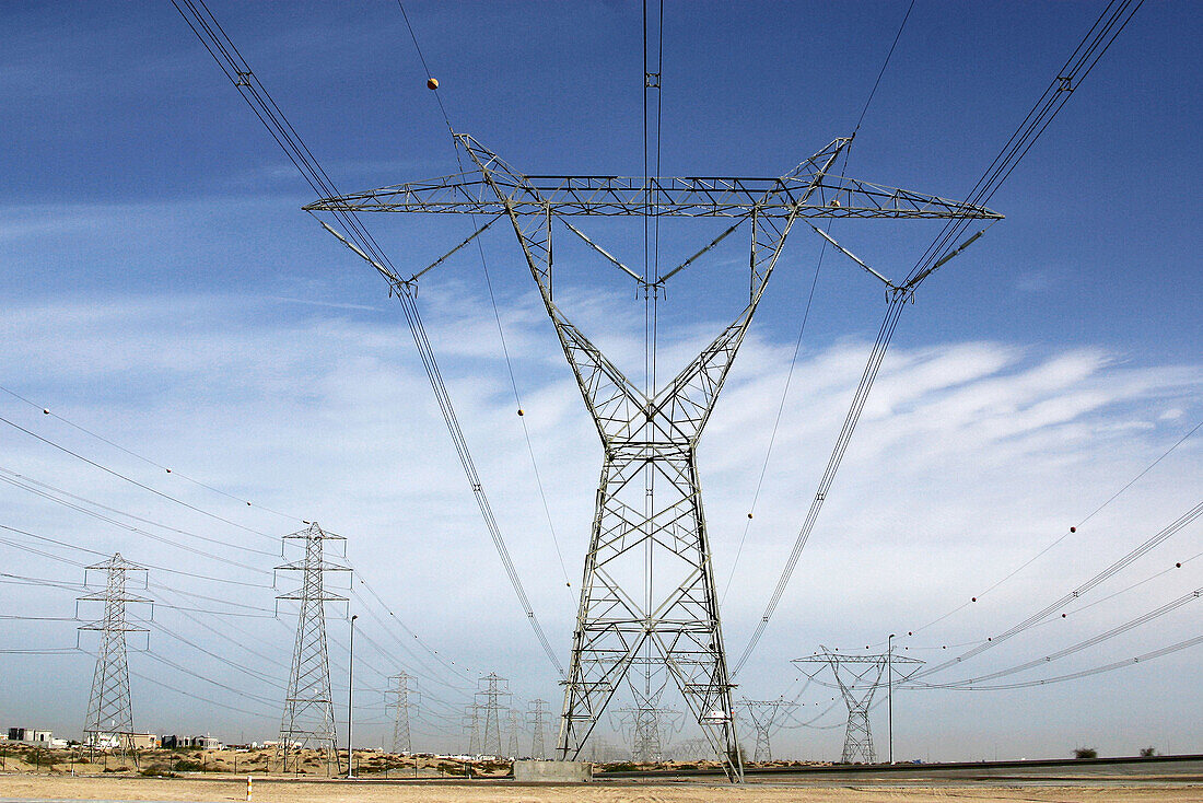 Power lines to Dubai City. Energy produced by oil power plants. UAE.