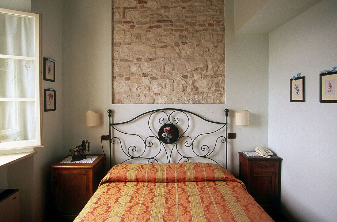 Bedroom at hotel. Sirolo, Mount Conero area. The Marches. Italy