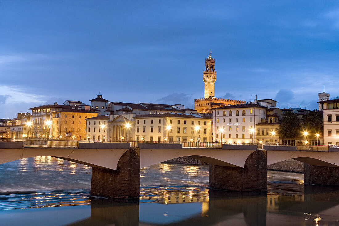 The Lungarni (Arno riverside) with the bell-tower of Palazzo Vecchio. Firenze. Italy