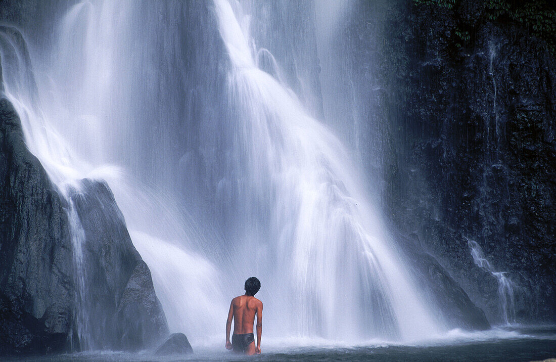 Man. Git Git waterfall. Bali. Indonesia.