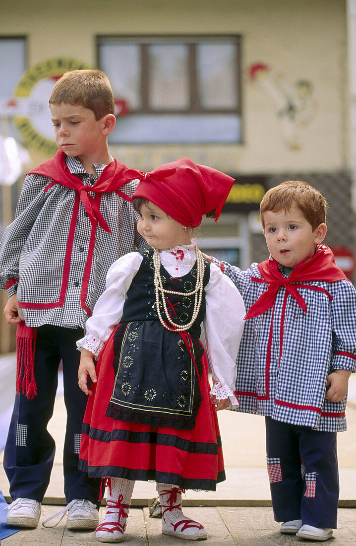 Children with typical costumes. Cantabria. Spain.