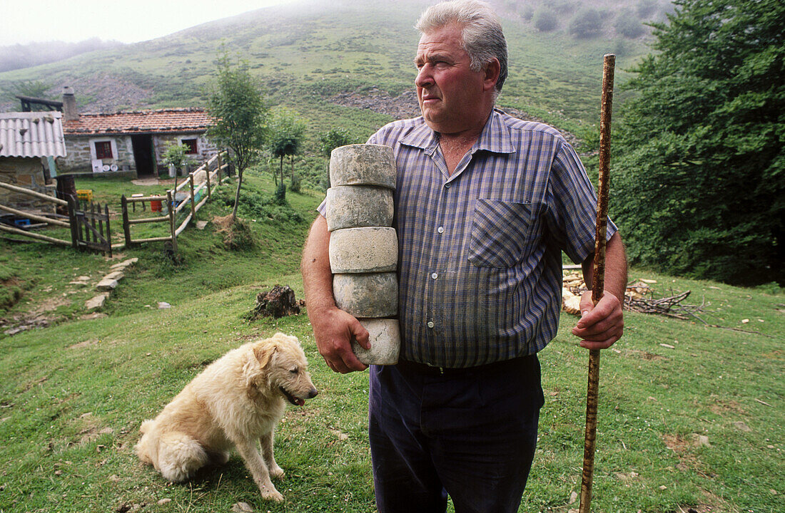 Shepherd with Gorbea cheeses. Gorbea mount. Álava. Vizcaya. Euskadi. Spain.