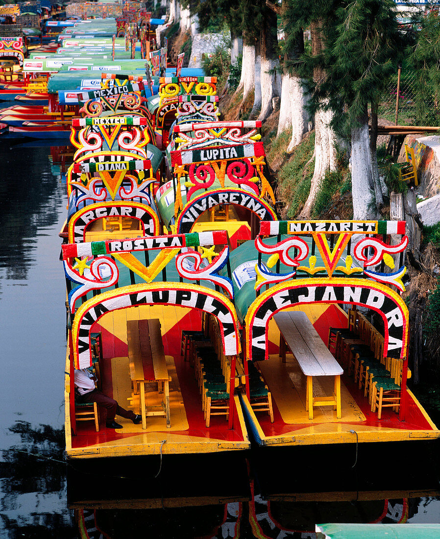 Boats in the channel of Xochimilco. Mexico City