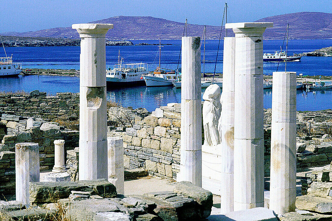 Jupiter temple ruins and harbour at rear. Delos, Cyclades Islands. Greece