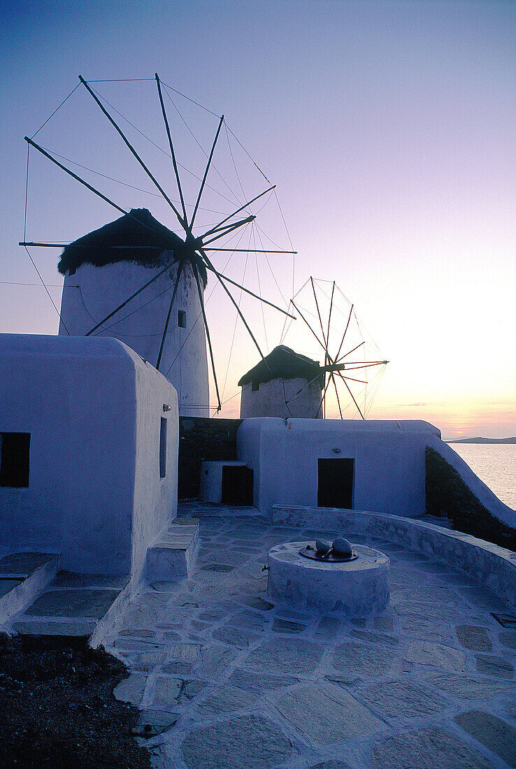 Windmills at dusk. Mykonos. Greece