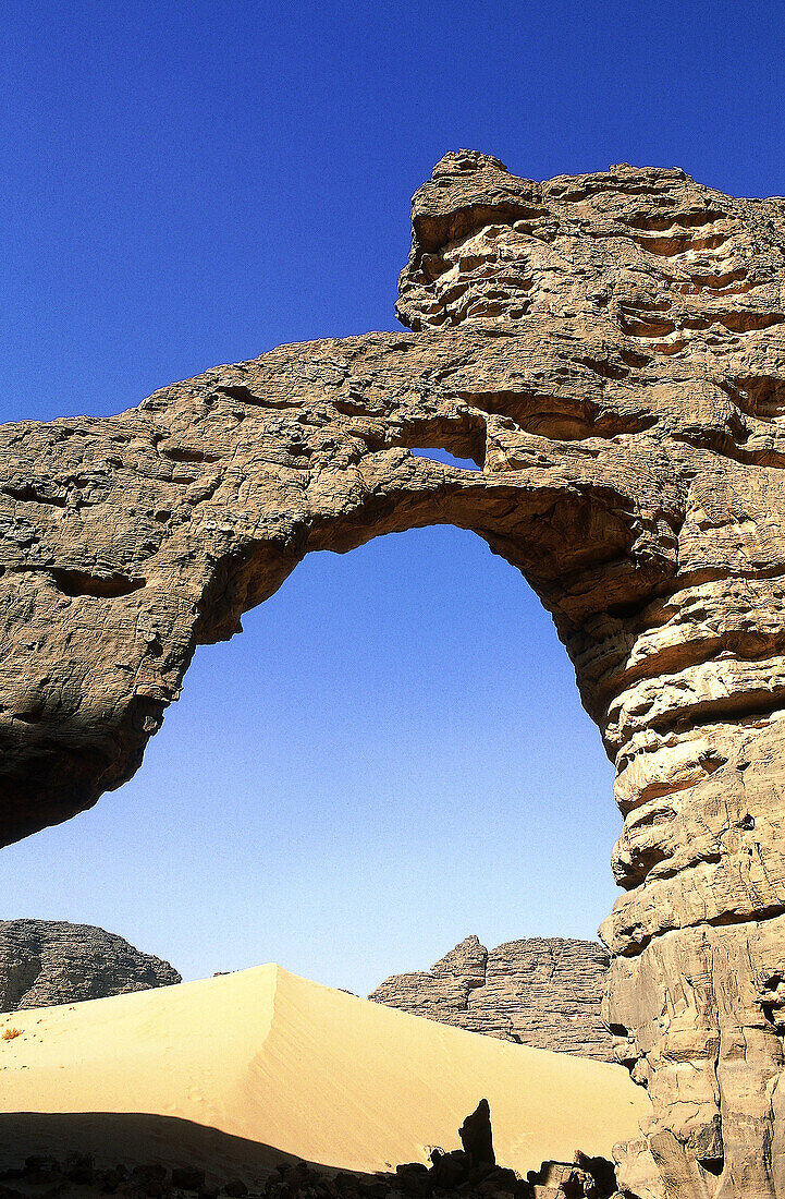Natural arch near Djanet oasis. Tassili n Ajjer area, Sahara desert. Algeria
