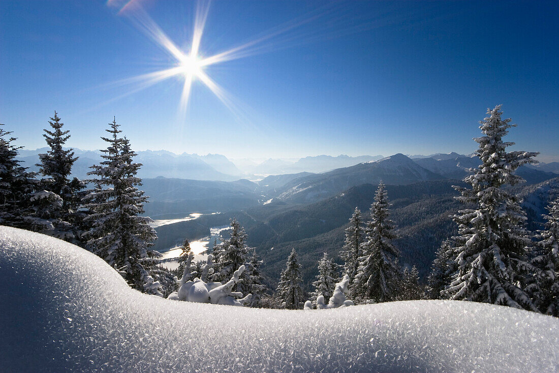 View from mount Herzogstand to mount Zugspitze in winter, Upper Bavaria, Germany